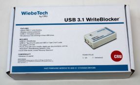 A boxed as new WiebeTech by CRU USB 3.1 WriteBlocker (International version) (Box sealed).