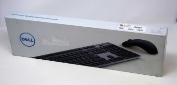 A boxed as new Dell KM717 Premier Keyboard And Mouse Set (QWERTY - UK) (Box sealed, some cosmetic