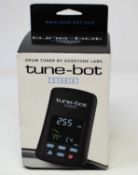A boxed as new Overtone Labs Tune-Bot Studio Electronic Drum Tuner (Some cosmetic damage to box).