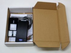 A boxed as new HID iClass SE R10 Mini Mullion Access Card Reader (P/N: 900NTNNEK00000).
