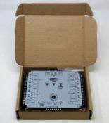 A boxed as new HID VertX V300 Output Control Interface (P/N: 70300AEP0N).