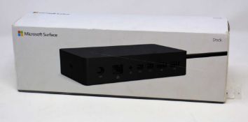 A boxed as new Microsoft Surface Dock (Model: 1661 PF3-00006) (Box opened, some cosmetic