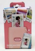 A boxed as new Fujifilm Instax Mini Link Smartphone Printer in Dusky Pink (Box opened).