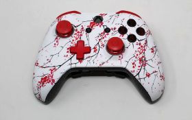 A boxed as new Scuf Prestige Wired/Wireless Professional Custom Xbox Controller in Cherry Blossom (