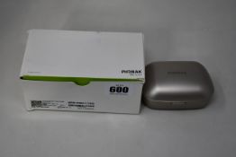 A boxed Phonak Marvel Charger Case Combi compatible with Marvel, Belong & Paradise Hearing Aids (