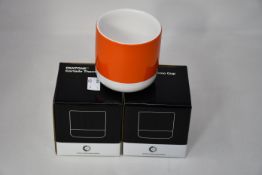 Six boxed as new PANTONE Cortado Thermo Cup in Orange 021.