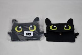 Twenty as new How to Train Your Dragon Toothless coin and card pouches.