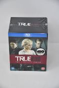 Three boxed as new Complete True Blood Series on Blu-ray.