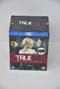 Three boxed as new Complete True Blood Series on Blu-ray.