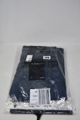 A pair of as new The Kooples slim blue vintage jeans (31 - €168).