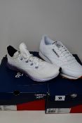 Two pairs of as new Reebok trainers; women's Flashfilm 2.0 (UK 7.5 - mark on right trainers requires