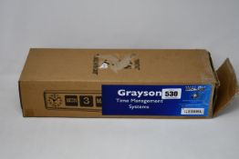 A boxed Grayson Automatic Calendar Clock (Model BQ-38) in Black.