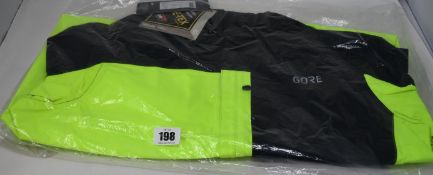 An as new Gore Wear C3 Paclite Gore-Tex hoodie jacket in fluorescent yellow/black (XL -RRP £137).