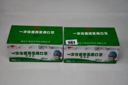 Two thousand boxed as new disposable face masks.