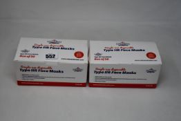 Two thousand boxed as new single-use disposable face masks.