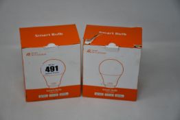Eight 2 pack boxes of Aiairer B22 Bayonet Smart Bulbs compatible with Alexa.
