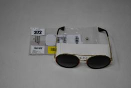 A pair of ladies as new Gucci GG0061S Sunglasses in gold, green and red (No case).