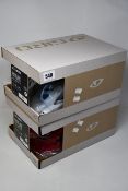 Two adult's boxed as new Giro Fixture Universal Fit (54-61cm) Cycling Helmets in trim red and