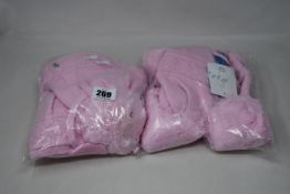 Six children's as new Satila Malva hats in pink (Sizes 45 and 53).