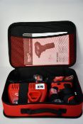 One boxed as new Milwaukee sub compact single speed 12v screwdriver set.