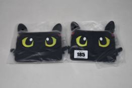Twenty as new How to Train Your Dragon Toothless coin and card pouches.