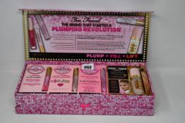One boxed as new Too Faced Plumping Revolution set to include Too Faced lip injection ultimate lip