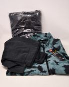 Six items of as new Under Armour sportswear; a pair of as new Launch shorts (L - RRP £24), two Storm