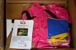 A boxed HomCom inflatable bouncy house.