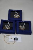 Three as new Swarovski ornament gingerbread reindeers (5533944) (Outer box of one creased).