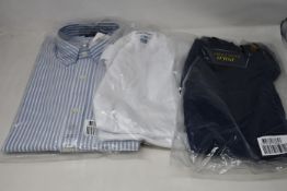 An as new Ralph Lauren shirt (L), plain white T-shirt (L) and navy T-shirt (XL).
