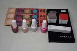 A collection of as new beauty products to include: three Benefit Cheek Party blusher sets, four 15ml