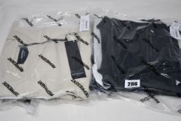 Two as new Represent Blank vintage T-shirts (1 x black, 1 x white, both L - RRP £70 each).