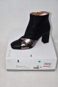 A pair of as new Pollini soft leather ankle boots (Soles show they may have been worn to try but