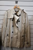 A Burberry Kensington short trench coat in stone (EU 56 - brand new with tags but black mark/stain