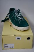 A pair of as new Converse Golf Le Fleur limited edition green sneakers (UK 8.5).