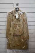 An as new Burberry Heritage Chelsea mid length trench coat (UK 6 - RRP €1790).