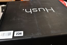 An as new Hush blue and white Sherpa 8lb throw (42” x 72” - RRP $190).