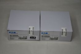 Eight boxed as new Eaton DET-RSMOKE radio smoke detectors.