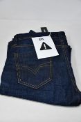 A pair of as new Diesel Larkee jeans (W33/L32).