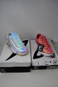 Two pairs of Fila Disruptor II trainers; Liquid Luster (UK 3) and Iridescent (UK 8).
