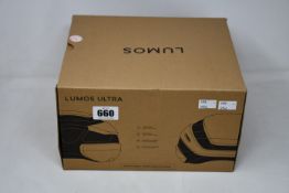 A boxed as new (Adult Sized) Lumos Ultra smart light bicycle helmet.