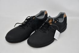A pair of as new Contour Foot Joy golf shoes (UK 11 - No box).