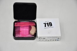 An as new Signia Contrast S+ Hearing Aid in Beige (REF: 10949268).