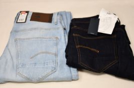 Four pairs of as new G-Star Raw jeans (2 x W30/L32, W30/L36, W31/L32).