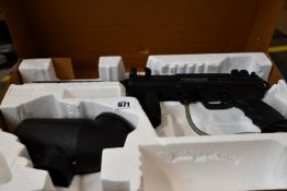 A pre-owned Tippmann A-5 paintball gun.