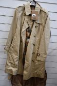An as new Burberry The Chelsea trench coat with coat bag (UK 6 - RRP £1490 - Mark on collar).