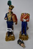 Two Bruno Merli designed soldier figurines (One in good condition, one with separated head, but