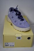 A pair of as new Converse Golf Le Fleur limited edition lavender sneakers (UK 8.5).