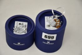 A boxed as new Swarovski ornament bear swinging on half moon inscribed Baby's 1st Christmas 2020 (