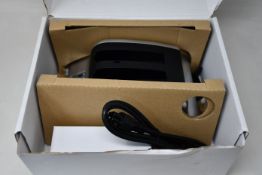 A boxed as new RRC 2-bay battery charger (PN: PMC02A) (Requires UK adapter).